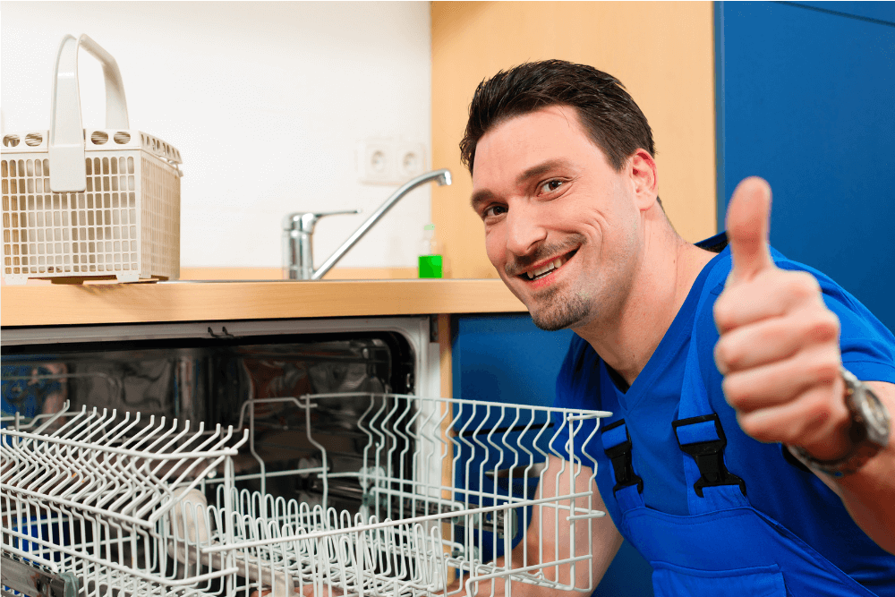 Certified dishwasher repair technician in Dubai fixing a modern built-in dishwasher